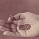 Three second-generation New York City subway tokens (Photo: Wikicommons)